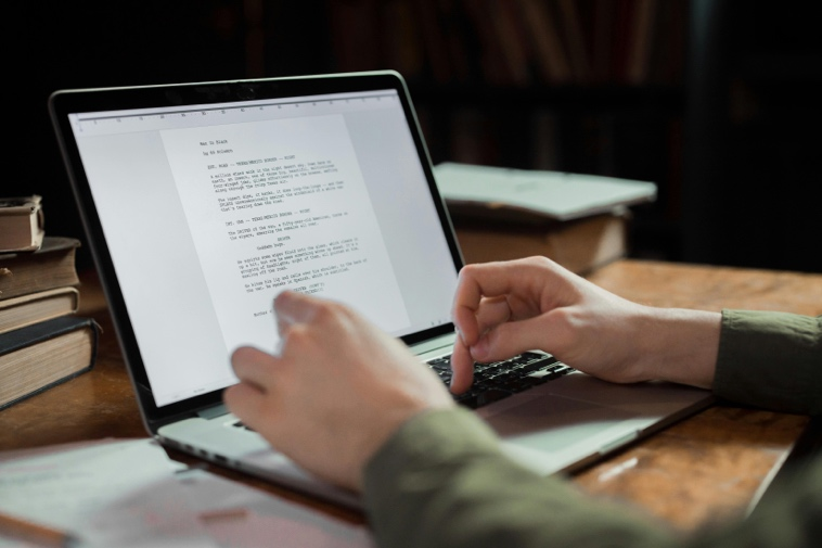 Student reviewing dissertation formatting, citations, and layout before final submission