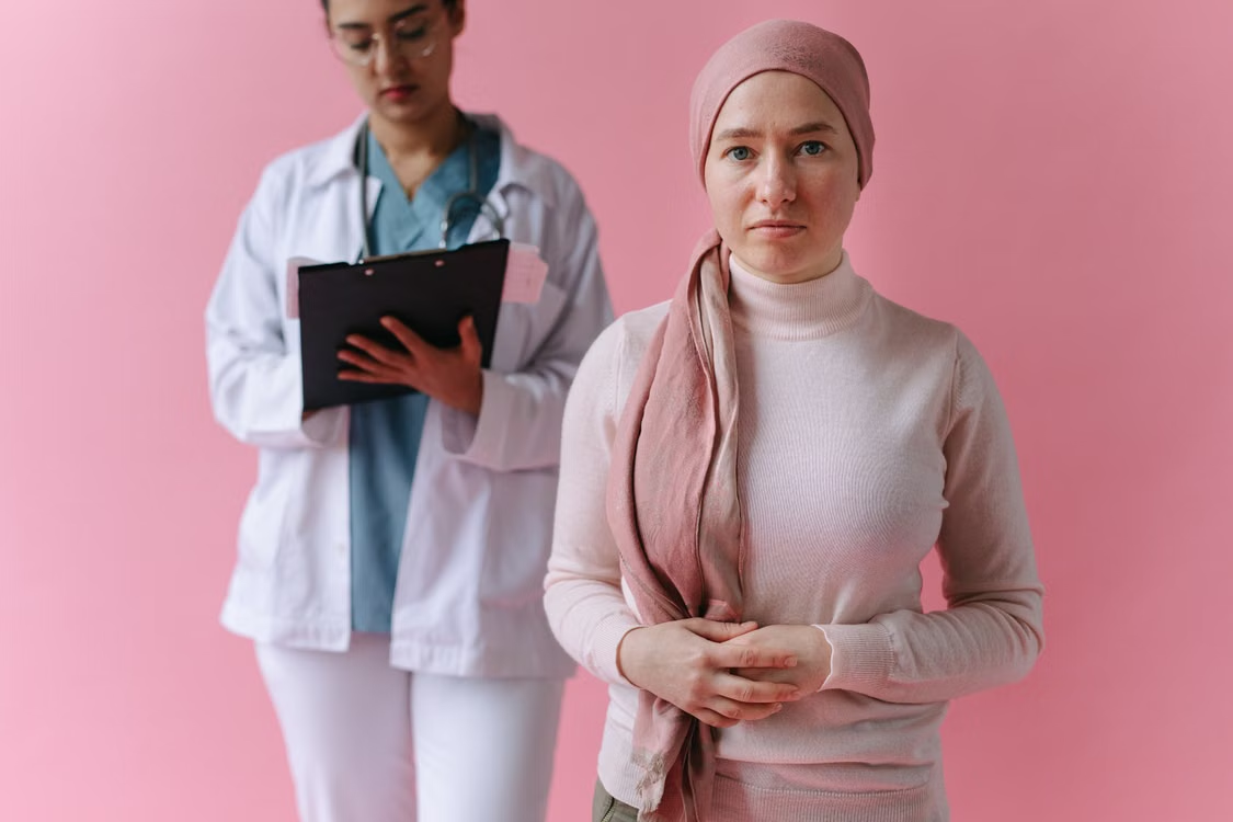 An oncology patient with a researcher.