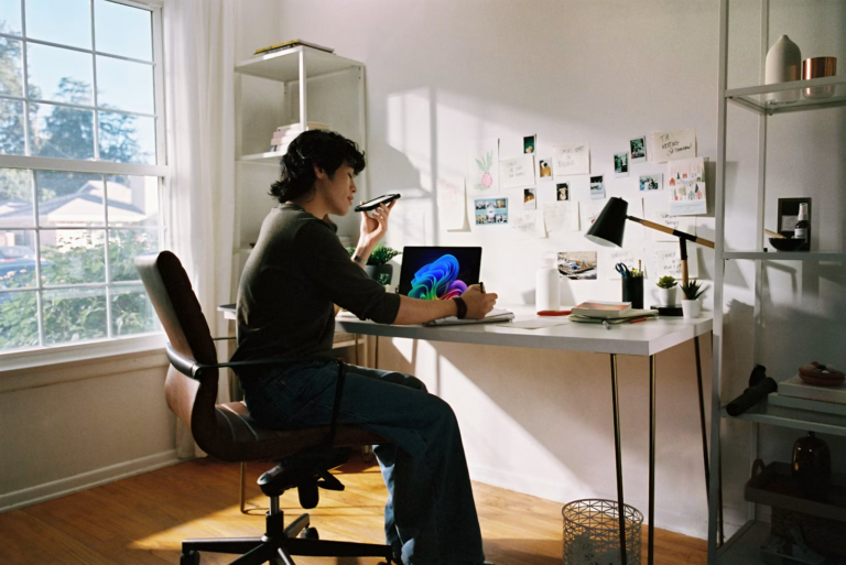 A woman works at her desk.
